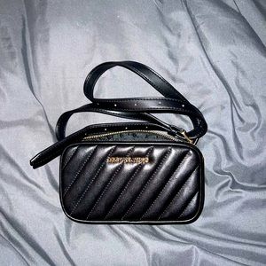 Michael Kors crossbody mini bag. Can be used as a belt bag or sling purse